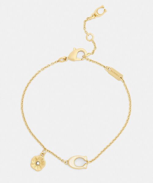 COACH（コーチ）の「エナメル シグネチャー ティーローズ チャーム リニア ブレスレット（ブレスレット・レディース・ゴールド系その他・ONE）」の2枚目の写真