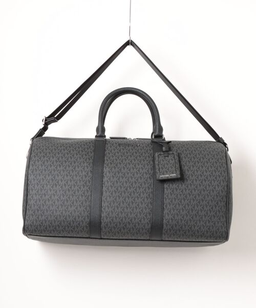 MICHAEL KORS(マイケルコース)の「HARRISON ダッフル ボストンバッグ - MKシグネチャー(ボストンバッグ・メンズ・ブラック・FREE)」の1枚目の写真