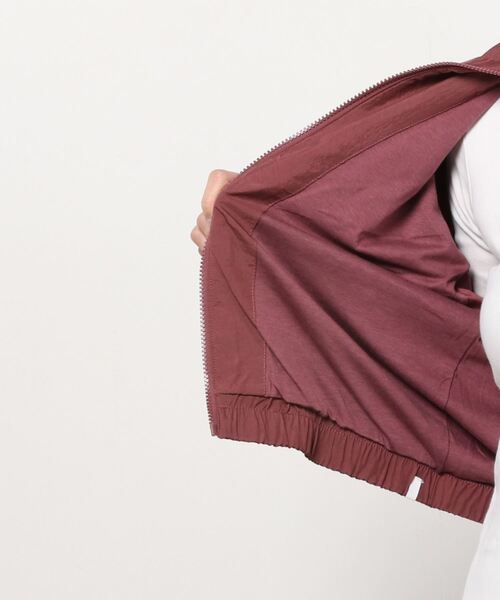 adidas（アディダス）の「アディカラー スプリット トレフォイル トラックジャケット / アディダスオリジナルス（ナイロンジャケット・レディース・ブラック/ブラウン/オフホワイト・MEDIUM/SMALL/X-SMALL/LARGE/X-LARGE/XX-LARGE）」の5枚目の写真