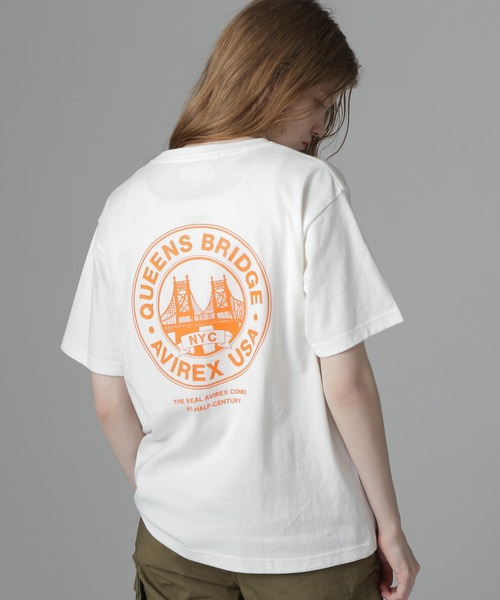 AVIREX(アヴィレックス)の「CIRCLE LOGO T-SHIRT "QUEENS BRIDGE"/サークルロゴTシャツ クイーンズブリッジ(Tシャツ/カットソー・レディース・ホワイト/ブルー系その他/ブラック・F)」の2枚目の写真