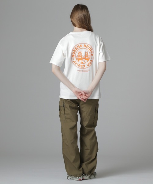 AVIREX(アヴィレックス)の「CIRCLE LOGO T-SHIRT "QUEENS BRIDGE"/サークルロゴTシャツ クイーンズブリッジ(Tシャツ/カットソー・レディース・ホワイト/ブルー系その他/ブラック・F)」の11枚目の写真