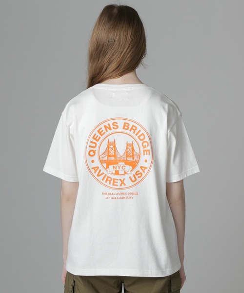 AVIREX(アヴィレックス)の「CIRCLE LOGO T-SHIRT "QUEENS BRIDGE"/サークルロゴTシャツ クイーンズブリッジ(Tシャツ/カットソー・レディース・ホワイト/ブルー系その他/ブラック・F)」の13枚目の写真