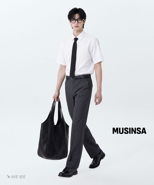 MUSINSA STANDARD（ムシンサスタンダード）の「シンセティックレザーラウンドショルダーバッグ[ブラック]（ショルダーバッグ・メンズ・その他・FREE）」の2枚目の写真