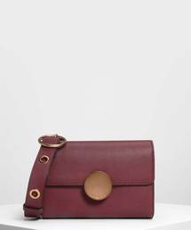 サーキュラープッシュロッククロスボディバッグ / Circular Push Lock Crossbody Bag