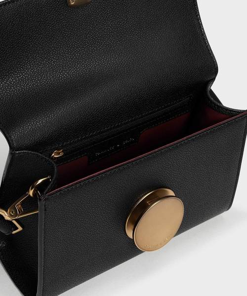 CHARLES & KEITH(チャールズ & キース)の「サーキュラープッシュロッククロスボディバッグ / Circular Push Lock Crossbody Bag(ショルダーバッグ・レディース・ブラック/ブルーグリーン/プラム・S)」の4枚目の写真
