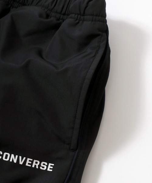 CONVERSE(コンバース)の「CONVERSE/コンバース 裏フリース ワンポイントロゴ サイドライン ナイロントラックパンツ レディース メンズ(その他パンツ・メンズ・ブラック/ネイビー/ワイン/カーキ・LL/L/M)」の5枚目の写真