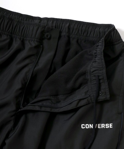 CONVERSE(コンバース)の「CONVERSE/コンバース 裏フリース ワンポイントロゴ サイドライン ナイロントラックパンツ レディース メンズ(その他パンツ・メンズ・ブラック/ネイビー/ワイン/カーキ・LL/L/M)」の6枚目の写真