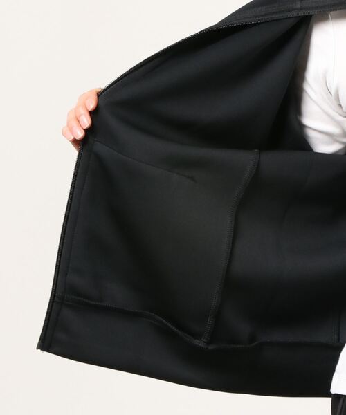 Reebok（リーボック）の「DMX トラック ジャケット / DMX Track Jacket（ジャージ・レディース・ブラック×イエロー・SMALL/MEDIUM/LARGE/X-LARGE）」の6枚目の写真