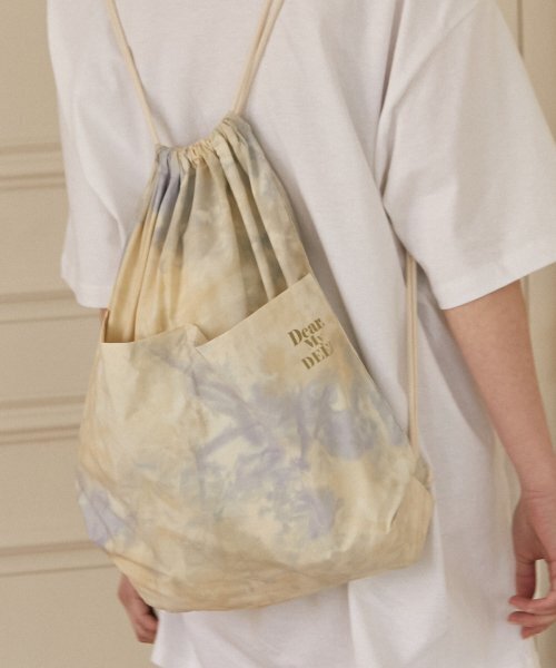 DEARMYDEER(ディアマイディア)の「String Backpack_ Yellow(バックパック/リュック・レディース・その他・FREE)」の1枚目の写真