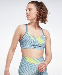 Reebok（リーボック）の「SR ラックス ストラッピー スポーツブラ / SR Lux Strappy Sports Bra（スポーツブラ）」