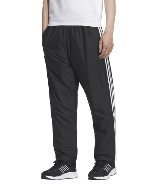 adidas(アディダス)の「アディダス adidas マストハブ スリーストライプス ルーズフィット WIND. RDY パデッドトラックパンツ(その他パンツ・メンズ・ブラック/ネイビー・S/M/L/LL/3L)」の1枚目の写真