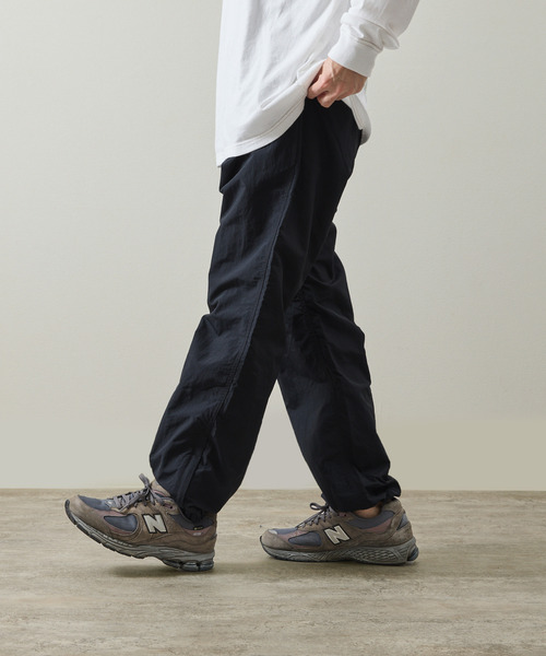 And A（アンドエー）の「Gramicci グラミチ / NYLON TRACK PANT 撥水防風ナイロントラックパンツ / G4SM-P119（その他パンツ・メンズ・オリーブ/ネイビー/ベージュ系その他/ブラック・SMALL/X-LARGE/LARGE/MEDIUM）」の15枚目の写真