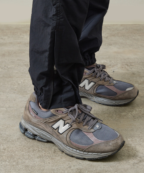 And A(アンドエー)の「Gramicci グラミチ / NYLON TRACK PANT 撥水防風ナイロントラックパンツ / G4SM-P119(その他パンツ・メンズ・オリーブ/ネイビー/ベージュ系その他/ブラック・SMALL/X-LARGE/LARGE/MEDIUM)」の17枚目の写真