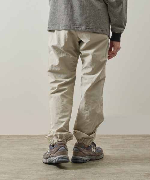 And A（アンドエー）の「Gramicci グラミチ / NYLON TRACK PANT 撥水防風ナイロントラックパンツ / G4SM-P119（その他パンツ・メンズ・オリーブ/ネイビー/ベージュ系その他/ブラック・SMALL/X-LARGE/LARGE/MEDIUM）」の5枚目の写真