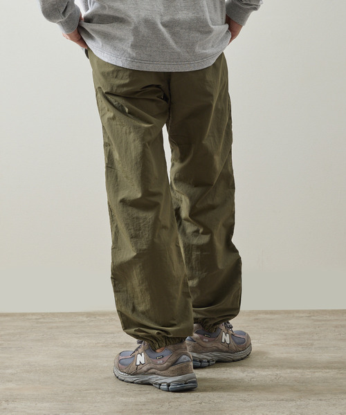And A（アンドエー）の「Gramicci グラミチ / NYLON TRACK PANT 撥水防風ナイロントラックパンツ / G4SM-P119（その他パンツ・メンズ・オリーブ/ネイビー/ベージュ系その他/ブラック・SMALL/X-LARGE/LARGE/MEDIUM）」の8枚目の写真