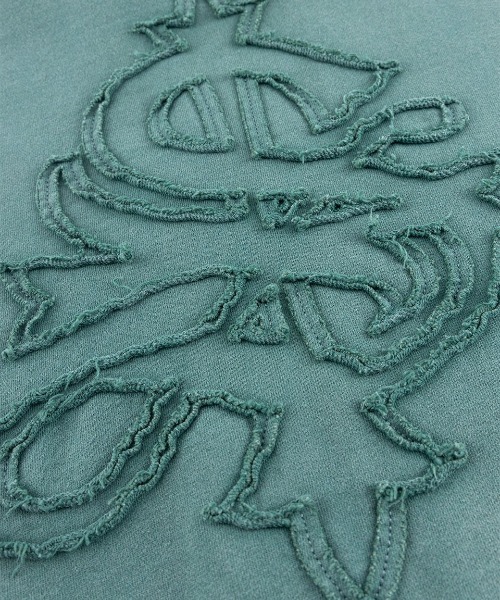 SUPPLIER(サプライヤー)の「A'GEM/9 × .kom 『SUPPLIER/サプライヤー』 Distressed Cross Zip Hoodie/ダメージ加工クロスジップパーカー(パーカー・メンズ・グリーン/ブラック・XL/L)」の10枚目の写真