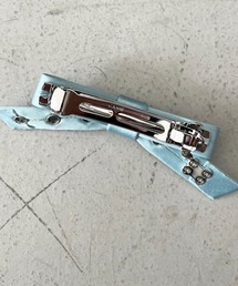 GANNI（ガニー）の「GANNI Eyelet Bow Barrette Satin（バレッタ