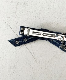 GANNI（ガニー）の「GANNI Eyelet Bow Barrette Satin（バレッタ