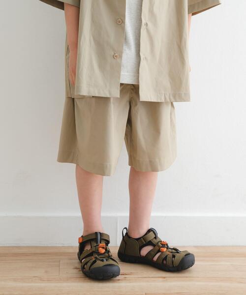 URBAN RESEARCH DOORS(アーバンリサーチドアーズ)の「『セットアップ対応』『UVカット』イージーショートパンツ(KIDS)(その他パンツ・キッズ・ベージュ/ネイビー・135/120)」の1枚目の写真
