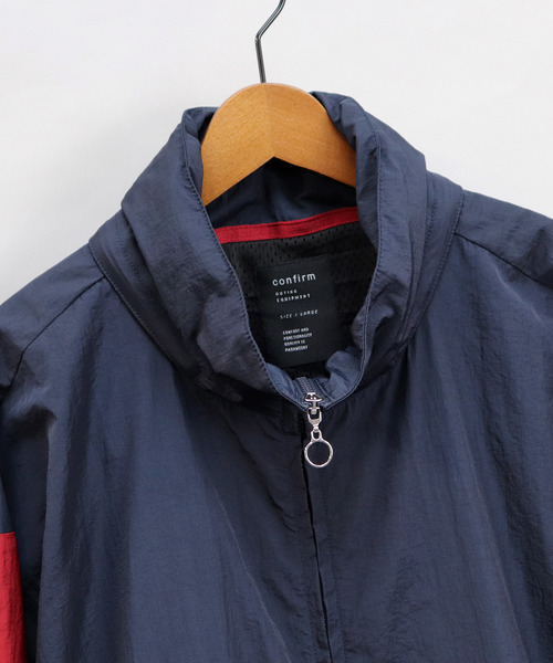 Confirm（コンファーム）の「Confirm / コンファーム ナイロントラックジャケット（ブルゾン・メンズ・ブラック/ネイビー・M/L）」の11枚目の写真