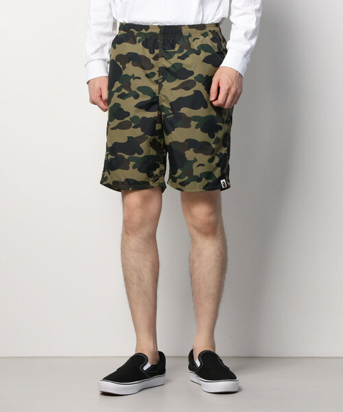 A BATHING APE(アベイシングエイプ)の「1ST CAMO BEACH SHORTS M(水着・メンズ・グリーン/イエロー・LARGE/MEDIUM/XX-LARGE/X-LARGE/SMALL)」の4枚目の写真