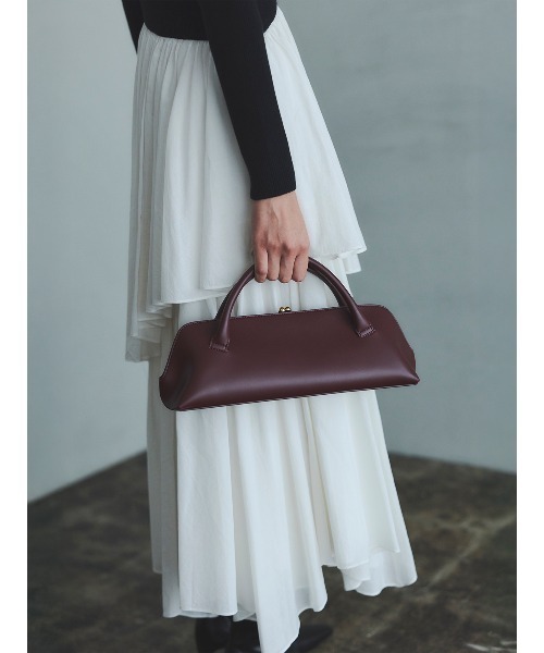 anuans（アニュアンス）の「ボートネックイレギュラーヘムドッキング