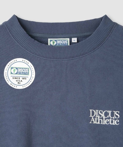 DISCUS(ディスカス)の「DISCUS ワンポイント刺繍アーチカレッジトレーナー(スウェット・レディース・ブラウン/ブルー系/オートミール・M/L)」の6枚目の写真