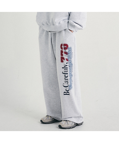 GAKKAI UNIONS(ガッカイユニオンズ)の「ウォーニングスウェットストリングパンツホワイトメランジ(スウェットパンツ・レディース・その他・LARGE/SMALL/MEDIUM)」の1枚目の写真
