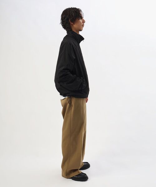 FFEIN(フェイン)の「【撥水加工】FFEIN(フェイン)リバーシブル撥水加工ナイロンフリースジャケット /リバーシブル ナイロン フリース スタンド フルジップ 刺繍 ワンポイント ドローコード(その他アウター・メンズ・ネイビー/ブラック/ブラウン/アイボリー・SMALL/MEDIUM/LARGE)」の11枚目の写真