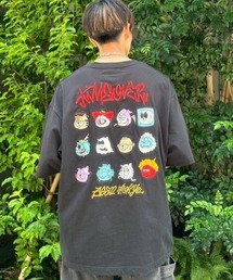 A'gem（エージェム）の「A'GEM/9 × .kom 『A'gem/エージェム』バックアイコン刺繍半袖Tシャツ（Tシャツ/カットソー）」