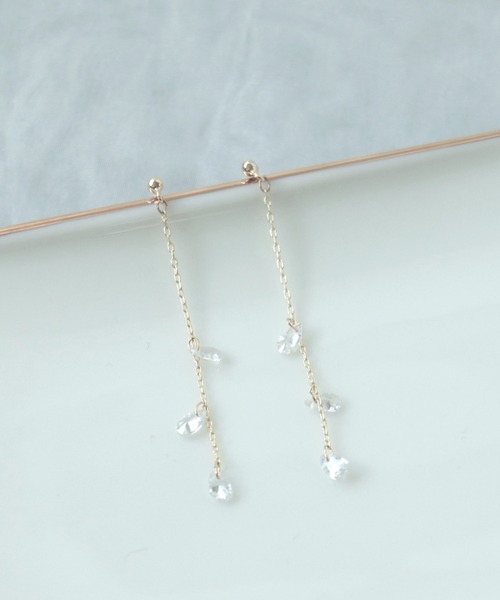 Three Four Time(スリーフォータイム)の「カットドロップロングセラミックピアス(ピアス(両耳用)・レディース・ゴールド/シルバー・FREE)」の1枚目の写真