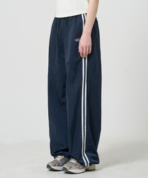 1993STUDIO（1993スタジオ）の「Symbol Logo Nylon Track Pants_Navy（スウェットパンツ・メンズ）」