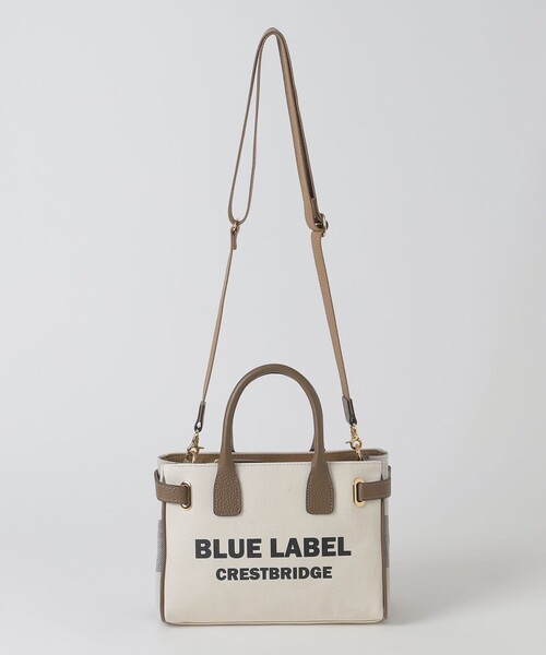 BLUE LABEL CRESTBRIDGE(ブルーレーベルクレストブリッジ)の「ロゴプリントハトメミドルトート(ハンドバッグ・レディース・オフホワイト/ブラック・FREE)」の6枚目の写真