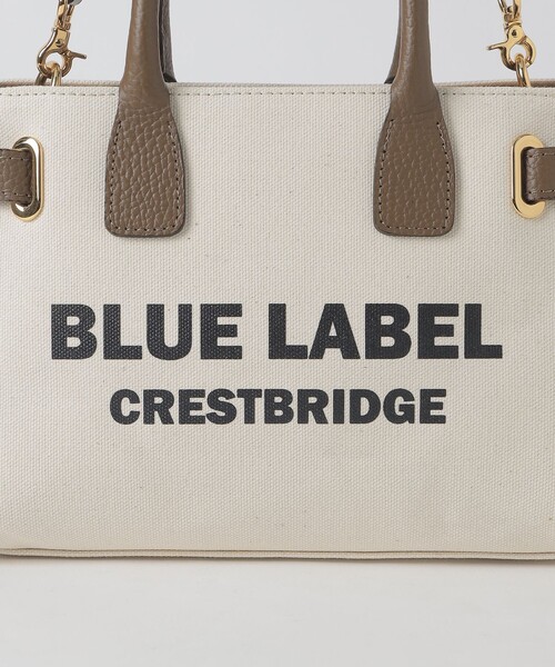 BLUE LABEL CRESTBRIDGE(ブルーレーベルクレストブリッジ)の「ロゴプリントハトメミドルトート(ハンドバッグ・レディース・オフホワイト/ブラック・FREE)」の3枚目の写真