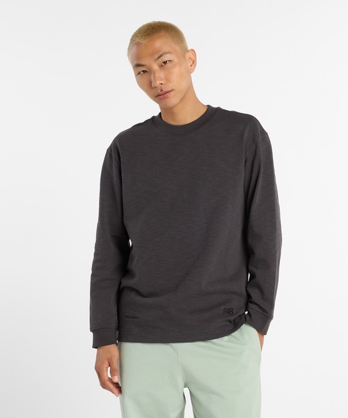 NEW BALANCE(ニューバランス)の「NB GREY ロングスリーブ(Tシャツ/カットソー・メンズ・アイボリー/ネイビー/ダークグレー・X-LARGE/LARGE/MEDIUM/SMALL/XX-LARGE)」の1枚目の写真