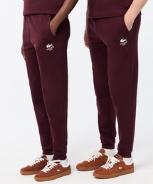 LACOSTE（ラコステ）の「裏パイル パリロゴプリントスウェットトラックパンツ / テーパードパンツ（スウェットパンツ）」