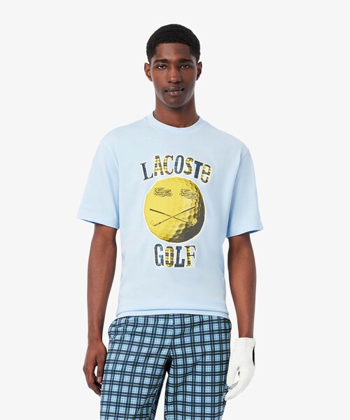 LACOSTE(ラコステ)の「スマイリーボールプリントゴルフTシャツ(Tシャツ/カットソー・メンズ・ライトブルー・4/5/3)」の1枚目の写真