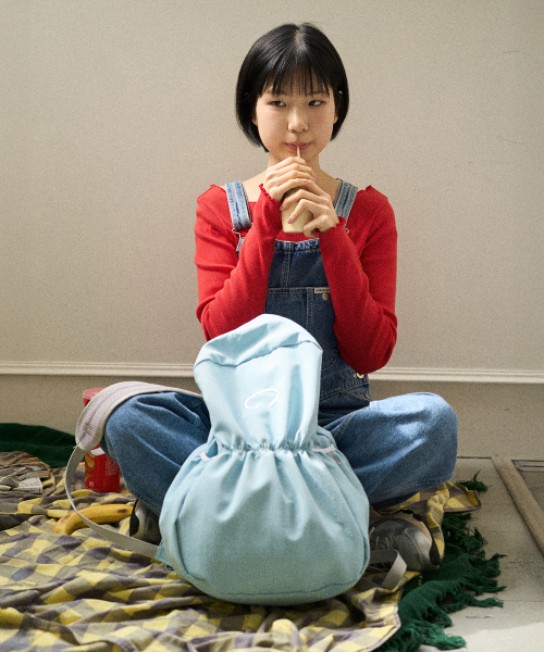 CHOROK STUDIO(チョロクスタジオ)の「Nagaja Peanut Bag #1 (Light Blue)(バックパック/リュック・レディース・ライトブルー・FREE)」の1枚目の写真
