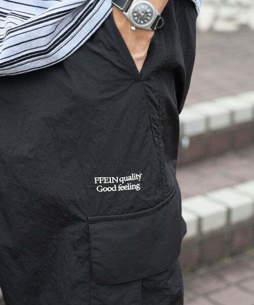 FFEIN(フェイン)の「【撥水加工】FFEIN(フェイン)カーゴナイロンワイドパンツ/ セットアップ ナイロンカーゴパンツ ワイドシルエット ドローコード(カーゴパンツ・メンズ・ブラック/アイボリー/ネイビー・SMALL/X-SMALL/LARGE/MEDIUM)」の9枚目の写真