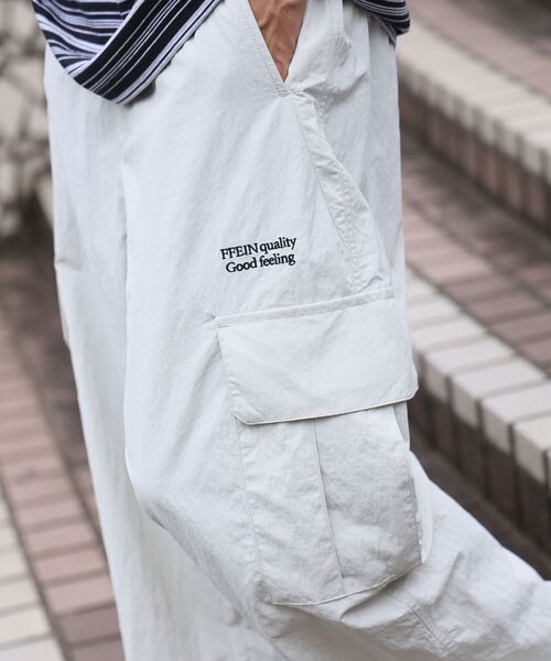 FFEIN(フェイン)の「【撥水加工】FFEIN(フェイン)カーゴナイロンワイドパンツ/ セットアップ ナイロンカーゴパンツ ワイドシルエット ドローコード(カーゴパンツ・メンズ・ブラック/アイボリー/ネイビー・SMALL/X-SMALL/LARGE/MEDIUM)」の12枚目の写真
