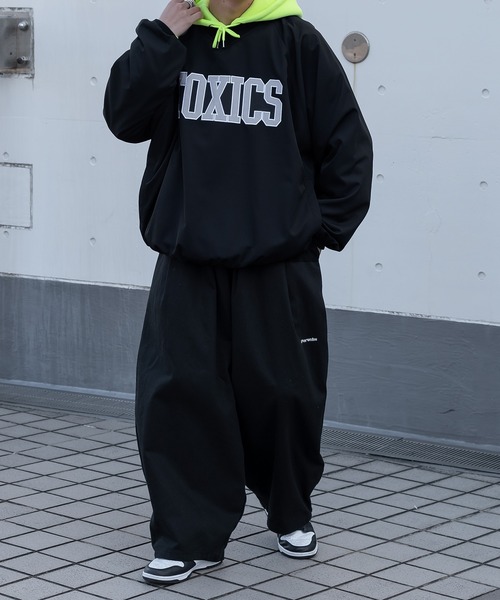 kutir(クティール)の「TOXICSカレッジプルオーバー(パーカー・メンズ・ブラック/イエロー/グリーン・MEDIUM/LARGE)」の11枚目の写真