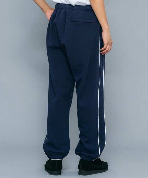 XLARGE（エクストララージ）の「EMBROIDERED LOGO PIPING SWEAT PANTS（スウェットパンツ・メンズ・アッシュ/ネイビー/ブラック・L/M/XL/S）」の5枚目の写真
