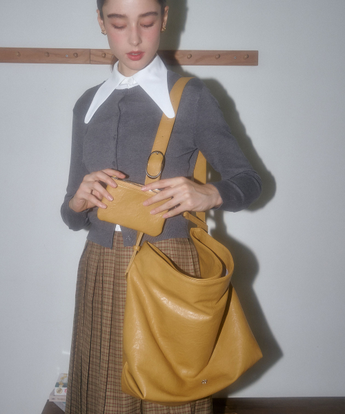 Uni&co.（ユニアンドコー）の「MESSENGER BAG (XS)/BROWNY YELLOW