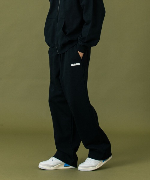 XLARGE(エクストララージ)の「SLANTED OG SWEAT PANTS(スウェットパンツ・メンズ・ブラック/アッシュ・XL/S/M/L)」の1枚目の写真