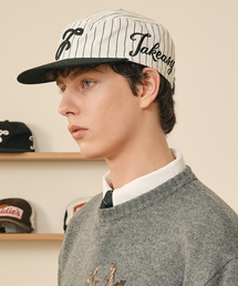 TAKEASY（テイクイージー）の「ストライプフィルボックスボールキャップ（ブラックストライプ）（キャップ）」