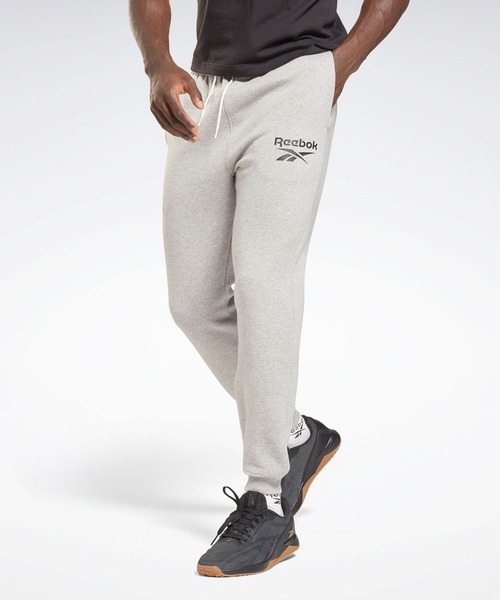 Reebok(リーボック)の「 アイデンティティ ベクター ジョガー / Identity Vector Joggers(スウェットパンツ・メンズ・ブラック/ヘザーグレー・SMALL/MEDIUM/LARGE/X-LARGE/XX-LARGE/XXX-LARGE/X-SMALL)」の1枚目の写真