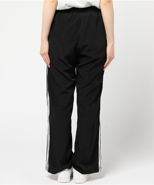 adidas（アディダス）の「オリジナルス パンツ[SIDE-SLIT CREPE TRACK