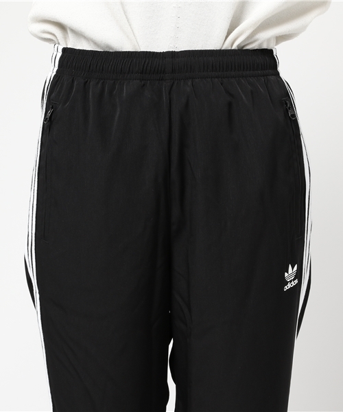 adidas（アディダス）の「オリジナルス パンツ[SIDE-SLIT CREPE