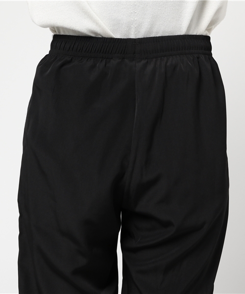 adidas（アディダス）の「オリジナルス パンツ[SIDE-SLIT CREPE