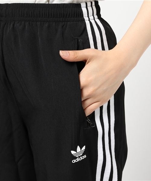 adidas（アディダス）の「オリジナルス パンツ[SIDE-SLIT CREPE TRACK